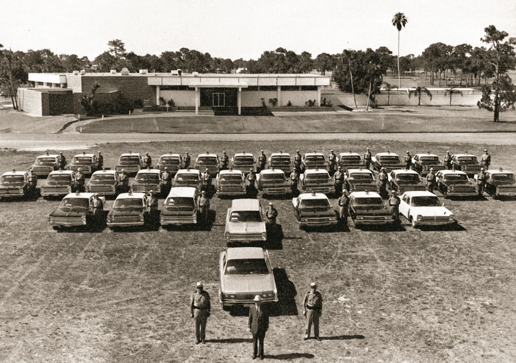 Capt. Raulerson, Col. Kirkman, and Lt. Conroy, in front of the new Bradenton Station, 1965