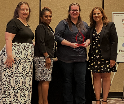 Arielle Hardesty accepts her award