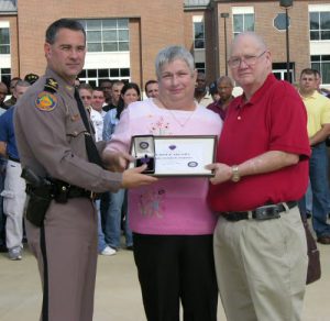 Trooper Chapman posthumously receives Purple Hear award.