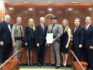 Trooper Litzell and his Wife with Gov. Scott, Col. Brierton and the Florida Cabinet