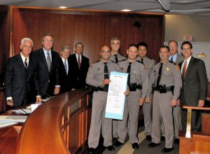Troopers Lopez-Torres and Austin receive the Trooper of the Year award
