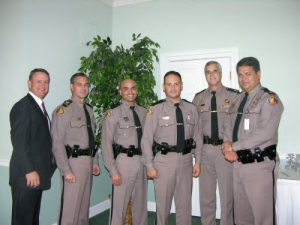 Troopers Lopez-Torres and Austin receive the Trooper of the Year award