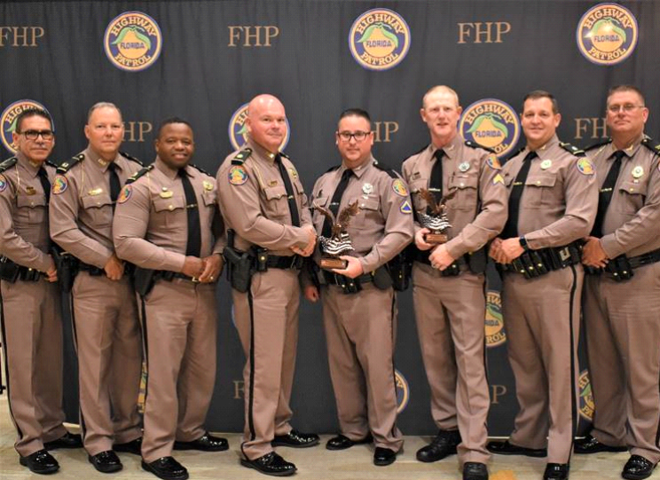 Left to Right: Captain Amos Santiago, Chief Jeff Dixon, Major Bill Harris, Major Erik McGuire, Trooper Jacob McMahan (FIC Grand Champion), Seargent Robert Smith (FIC Runner-Up Champion), Lieutenant Colonel Troy Thompson, Captain Ezra Folsom