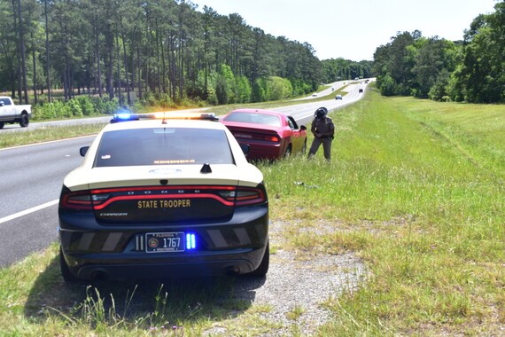 Operation Sothern Slow Down with a trooper pulling over a vehicle for speeding.