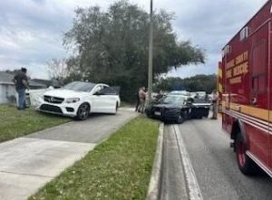 Car chase ends with vehicle on sidewalk