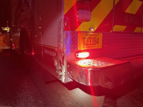 Damage to left rear of ambulance