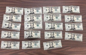 FHP detiene a conductor en sentido contrario , luego acusado de DUI y posesión de billetes falsos